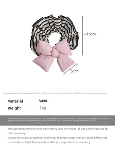Detail view of a striped scrunchie with a large pink bow, showing 16cm size dimensions