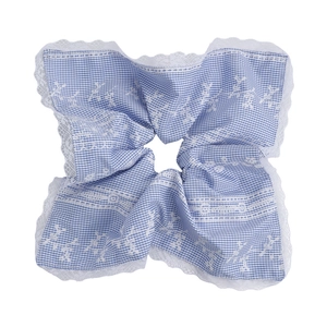 Light blue gingham scrunchie with white embroidery lace edges for women hair styling