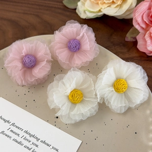 Chic organza flower stud earrings with woven center for a stylish vacation look