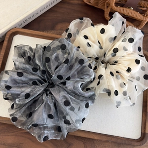 Oversized organza scrunchies in gray and cream colors with classic polka dot pattern