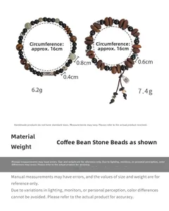 Detail view of coffee bean and tiger eye beaded bracelets with Fu character pendant