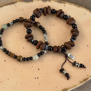 Tiger eye and coffee bean beaded bracelets with silver fish tube and Fu pendant