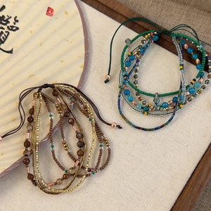 Maillard-style multi-layer beaded bracelets with vintage ethnic charms and tassels
