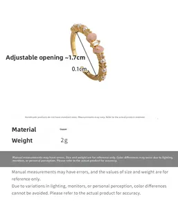 Detail of adjustable copper ring with pink enamel bow and micro-set zircon stone