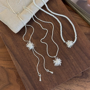 Silver firework star pendant necklace set with pearls and adjustable snake chain