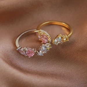 Bagues réglables dorées et argentées avec cœur rose et oxydes de zirconium sertis
