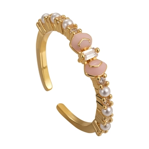 Elegant gold open ring with white pearls, zircons and pink enamel bow decoration