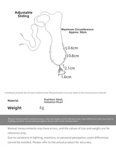 Macro view of adjustable mermaid tail pendant with pearls on stainless steel chain