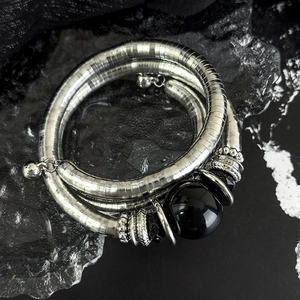 Three-layer silver elastic bracelet with black stone pendant in punk vintage style