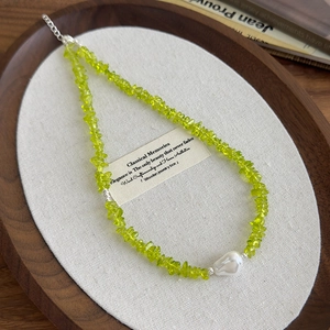 Olive green stone beaded necklace with baroque pearl drop and adjustable clasp