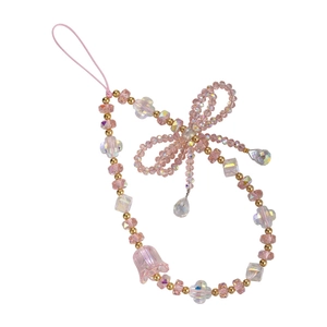 Pink crystal beaded phone strap with aesthetic bow and lily of the valley charm