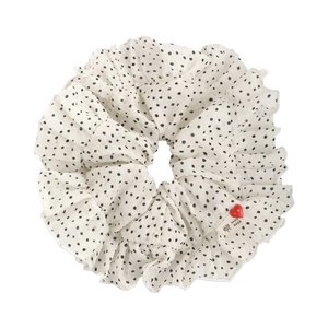 Polka dot ruffled scrunchie with red heart button and hand made label on white base