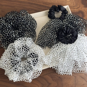 Sparkly sequin lace scrunchies in black and silver colors for elegant hair styling