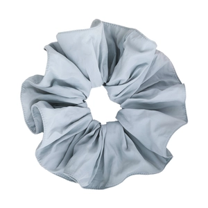 Elegant dusty blue satin scrunchie with large ruffled edge for high ponytail styling