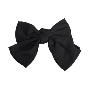 Elegant large black satin layered bow hair clip with matte texture and classic spring clip