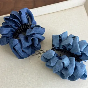 Blue denim pleated floral hair claws with voluminous bubble design for stylish ponytails