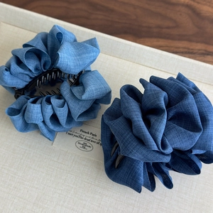 Denim fabric pleated claw clips in light and dark blue for voluminous hair styling