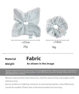 Detailed size and weight chart for light blue lace scrunchies with handmade label
