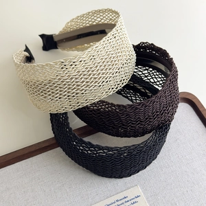 Three-piece set of bohemian woven wide headbands in cream, brown, and black colors