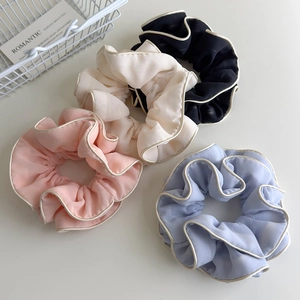 Set of four pastel chiffon scrunchies with white contrast piping for hair styling