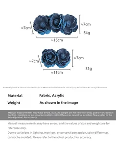 Detailed size and weight specs for blue denim camellia banana hair clips with fabric texture