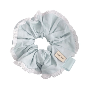 Light blue scrunchie with white lace trim and Hand Made label for sweet hairstyles