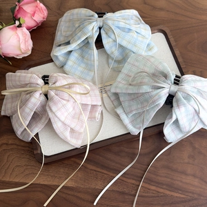 Sweet plaid bow hair claws in pink, blue, and green colors for women hair styling