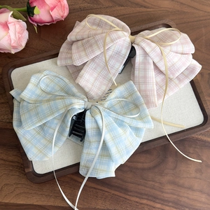 Sweet plaid bow hair claws in pink and blue with long ribbons for elegant hairstyling