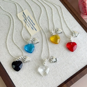 Colorful heart pendant necklaces with silver bead chains in five vibrant summer dopamine colors