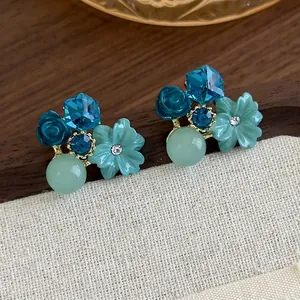 Blue sugar cube crystal flower stud earrings with resin rose and mint green beads