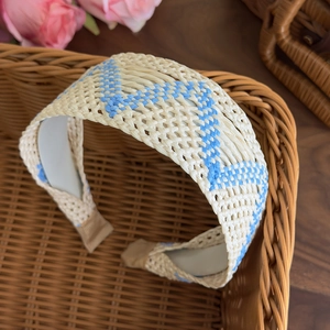 Close-up of bohemian woven wide headband with blue wave pattern and non-slip lining