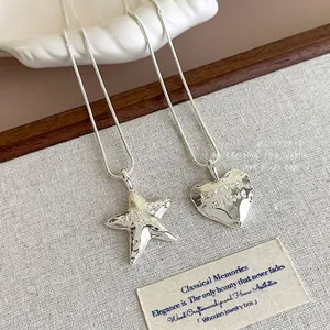 Long pull-out necklace with hammered silver heart and star pendants engraved with promise me
