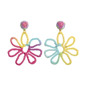 Handmade woven raffia flower earrings in vibrant pastel colors for beach vacation styling