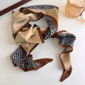 Slim satin scarf with vintage mustard houndstooth and herringbone patterns for styling