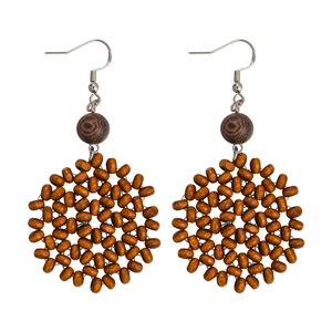 Handmade bohemian style wooden bead hoop earrings for beach vacation and resort wear