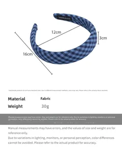 Detailed view of blue gingham headband showing size dimensions and handmade label