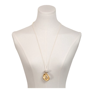 Minimalist geometric irregular gold pendant necklace with grey bead on adjustable white cord