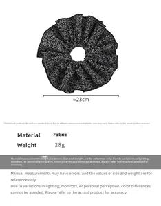 Détail du chouchou géant en tissu floral noir de 23cm avec dimensions et poids précis