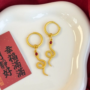 Elegant gold snake earrings with red gemstone drop, Chinese Zodiac theme New Year style