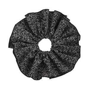 Chouchou géant imprimé floral en tissu noir avec motifs de petites fleurs blanches