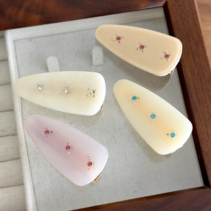 French vintage iridescent acetate hair clips set with rhinestones and geometric design