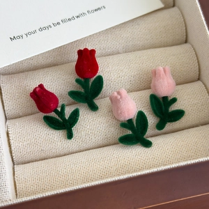 Elegant red velvet tulip stud earrings with green leaves in a gift box