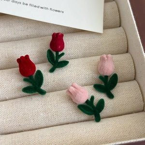 Sweet tulip stud earrings with red and pink velvet flocking finish in a jewelry box