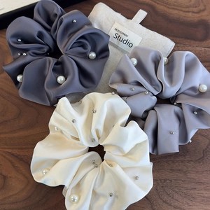Elegant satin scrunchies with pearls and metal studs in grey, purple and ivory colors