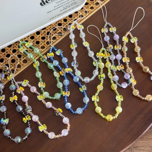 Dragonne de téléphone en perles colorées avec breloques papillon 3D et perles vibrantes