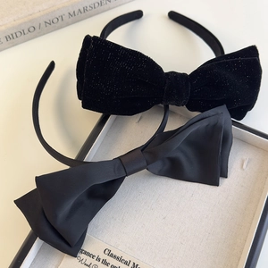 Elegant black velvet and satin oversized bow headbands set with high crown effect