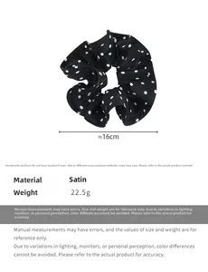 Detailed size chart of black polka dot satin scrunchie showing 16cm diameter and 22.5g weight
