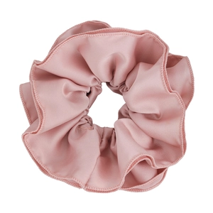 Elegant dusty pink oversized satin scrunchie with pleated edges for bun hairstyles