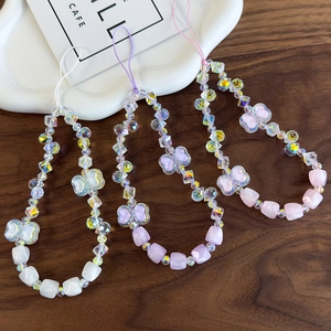 Handmade beaded phone straps with butterfly charms in white, purple, and pink colors