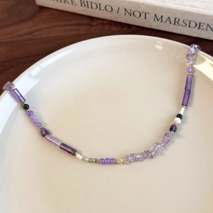 Dark purple beaded necklace with irregular stones and pearls for a vintage aesthetic